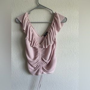 Women’s tank top size medium. This is new with tags from Express . Light pink .